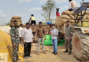 మొక్కజొన్న బస్తాలు గోదాంలకు తరలింపు